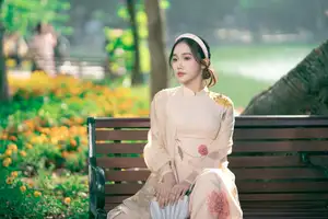 Graceful Vietnamese Beauty: Captivating Charm of a Girl in Elegant Traditional Attire - image 7