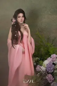 Lilly Luta Transforms into 'Living Doll' in Flowing Pink Silk Gown, Fairytale Beauty Unveiled - image 2