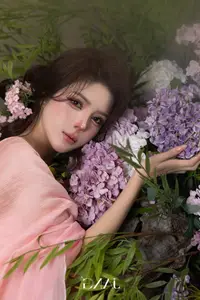 Lilly Luta Transforms into 'Living Doll' in Flowing Pink Silk Gown, Fairytale Beauty Unveiled - image 0