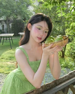 Mukbang Influencer Transforms into a Green Fairy in Enchanting Summer Gallery - image 2