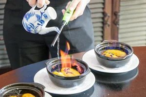 The Art of Flambé: An Giang's Unique 120,000 VND Fire-Roasted Banana Dessert - image 5