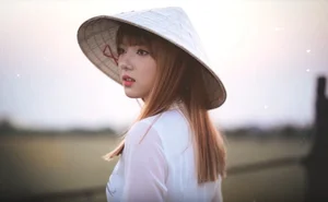 Thai Influencer Goes Viral with Elegant Vietnamese Ao Dai Photoshoot - image 3