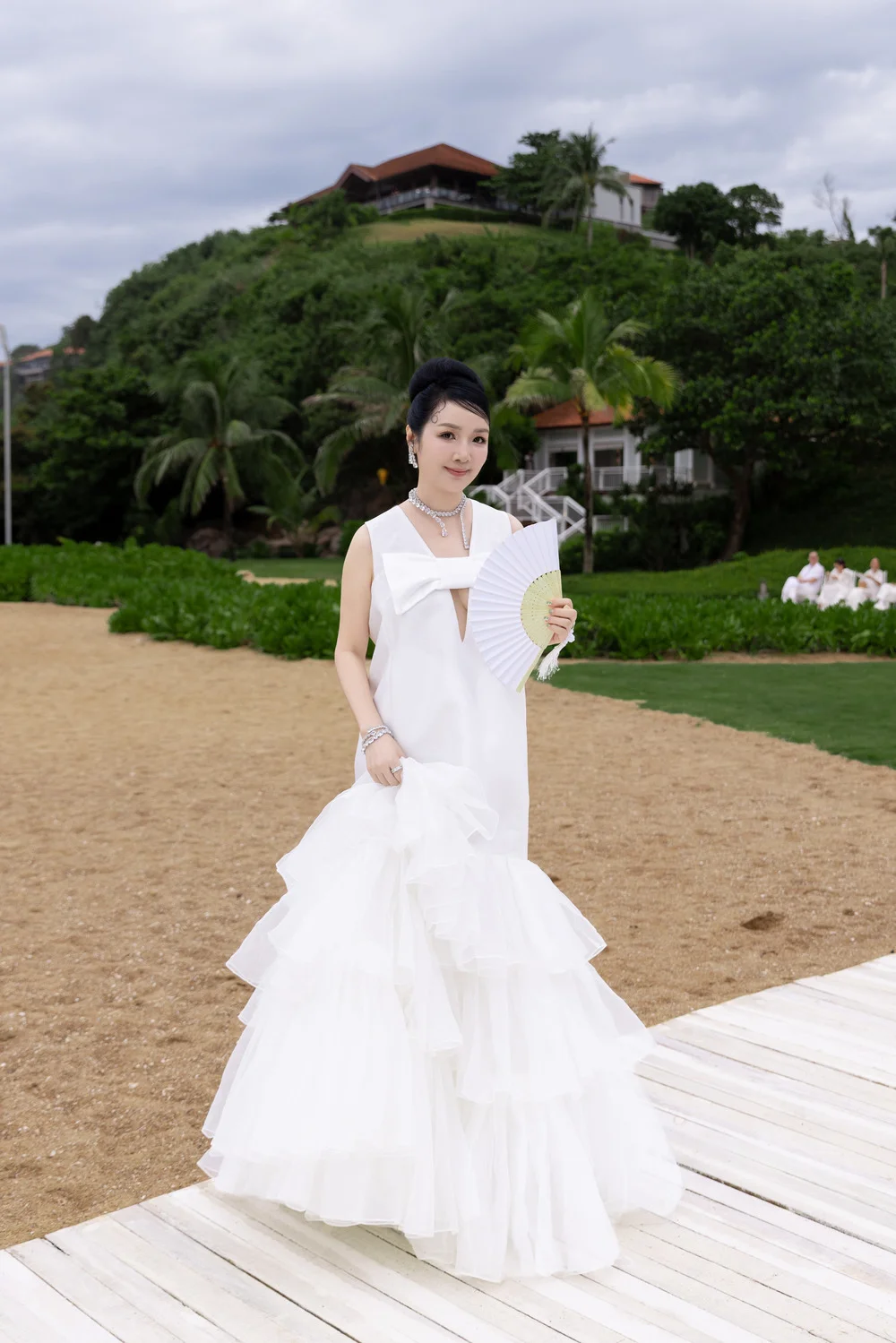 Beauty Queens Dazzle in All-White Outfits at VUNGOC&SON Fashion Show
