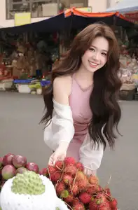 Charming Asian Beauty in a Vibrant Vietnamese Traditional Market - image 2