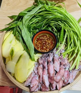 The Secret Behind the Viral Squid Rolled in Water Spinach Trend - image 0