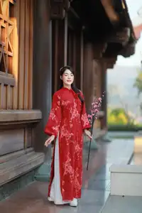 Elegant Red Ao Dai: Vietnamese Beauty with Cherry Blossoms in Ancient Architecture - image 4