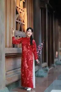 Elegant Red Ao Dai: Vietnamese Beauty with Cherry Blossoms in Ancient Architecture - image 2