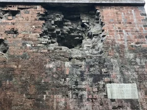 The Historic Significance of Mysterious Dents on Hanoi's Ancient Citadel Wall - image 3
