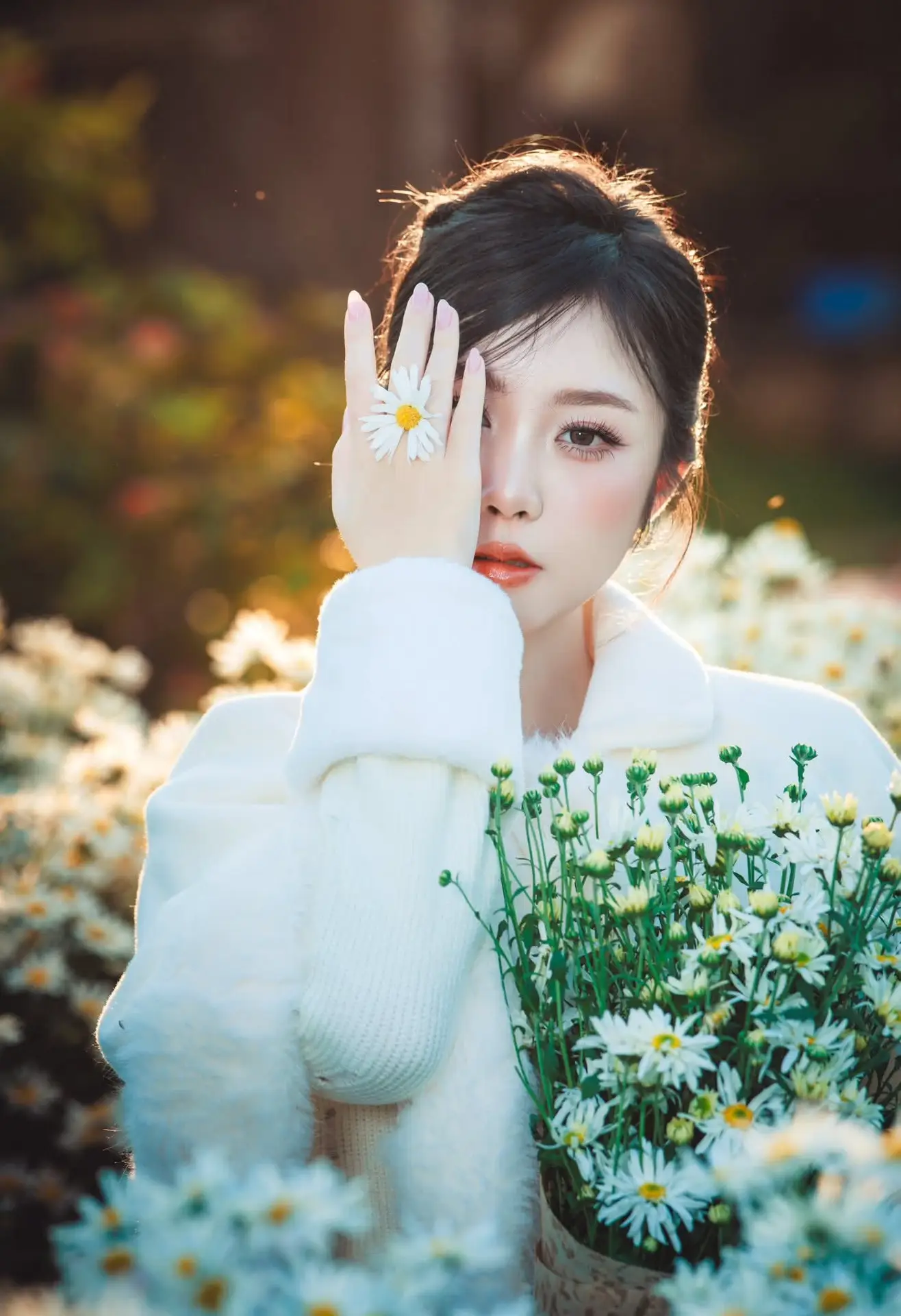 VGU No.191 1000024575: A Girl's Gentle Charm Amidst Pristine White Daisies in Winter.