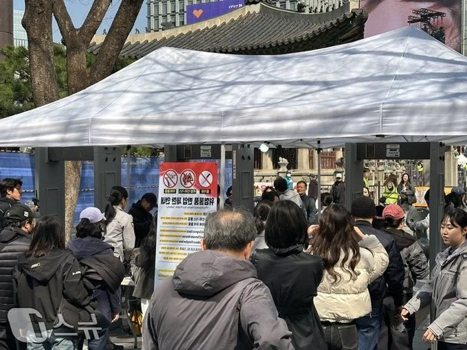 Security Crackdown in Seoul: Citizens Subjected to Body Searches During BTS Event