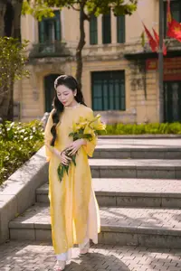 Graceful Vietnamese Beauty: Elegant Woman in Modern Traditional Attire Captures Asian Charm - image 0