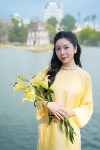Graceful Vietnamese Beauty: Elegant Woman in Modern Traditional Attire Captures Asian Charm - image 4