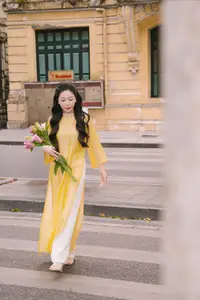 Graceful Vietnamese Beauty: Elegant Woman in Modern Traditional Attire Captures Asian Charm - image 3