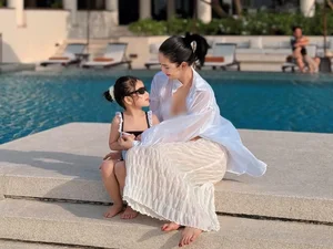 Model Ngoc Trinh Enjoys Peaceful Family Vacation with Adopted Daughter - image 7