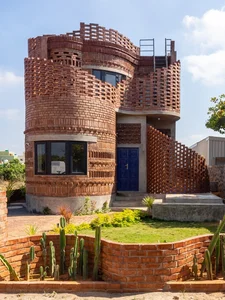 Innovative Architecture: The Unique Brick House Inspired by Rhythmic Ocean Waves - image 0
