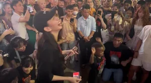 Miss Thuy Tien and Loi Con Create a Buzz at the Local Walking Street - image 2