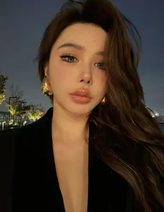 Elegant Nightwear Fashion: Influencer with 1.5 Million Fans Poses by the Window - image 3