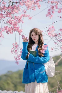 Dreamy muse amidst the blooming cherry blossoms in Da Lat - image 2