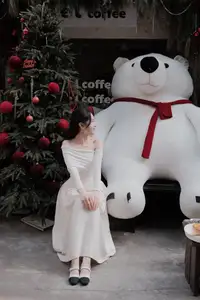 Christmas Radiance: Girl in Elegant White Dress and Joyful Smile - image 2