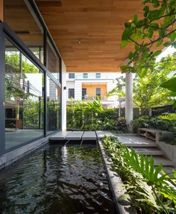 Modern Architecture: Exploring the Unique Three-Sided Open House with Solid and Void Interplay - image 4