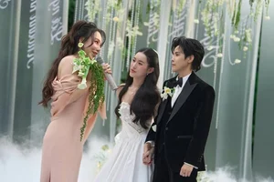 Ho Quynh Huong’s Elegant Ao Dai Fitting for Her Special Day: Traditional Bridal Inspiration - image 1
