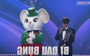 The Masked Singer Vietnam: Quang Dung's Iconic Performance and the Mystery of the Funny Character - image 2