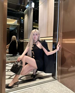 Stunning Vietnamese Female DJ Sets Trends with Bold Elevator Fashion Poses - image 4