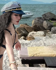 Võ Ngọc Trân Sets Social Media Ablaze with Stunning Beach Fashion - image 2