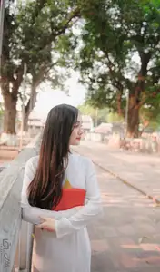 Graceful Vietnamese Girl in White Ao Dai, Radiant Smile at Ancient Site 1000026917 - image 13