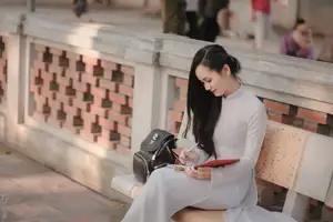 Graceful Vietnamese Girl in White Ao Dai, Radiant Smile at Ancient Site 1000026917 - image 18