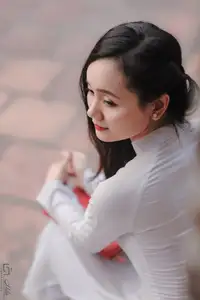 Graceful Vietnamese Girl in White Ao Dai, Radiant Smile at Ancient Site 1000026917 - image 14