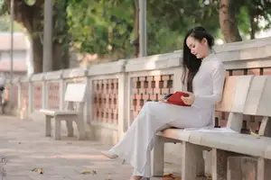 Graceful Vietnamese Girl in White Ao Dai, Radiant Smile at Ancient Site 1000026917 - image 15