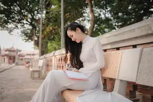 Graceful Vietnamese Girl in White Ao Dai, Radiant Smile at Ancient Site 1000026917 - image 12