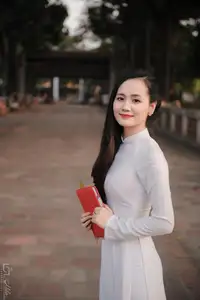 Graceful Vietnamese Girl in White Ao Dai, Radiant Smile at Ancient Site 1000026917 - image 21