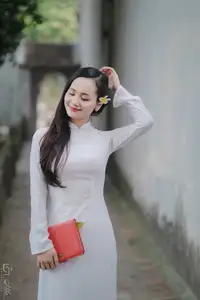 Graceful Vietnamese Girl in White Ao Dai, Radiant Smile at Ancient Site 1000026917 - image 10