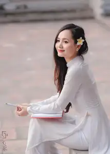 Graceful Vietnamese Girl in White Ao Dai, Radiant Smile at Ancient Site 1000026917 - image 7