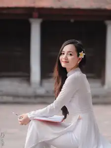 Graceful Vietnamese Girl in White Ao Dai, Radiant Smile at Ancient Site 1000026917 - image 20