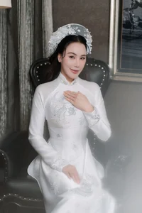 Vietnamese Singer Hồ Quỳnh Hương Showcases Elegant Traditional Wedding Ao Dai Collection - image 6