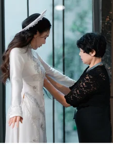 Vietnamese Singer Hồ Quỳnh Hương Showcases Elegant Traditional Wedding Ao Dai Collection - image 7