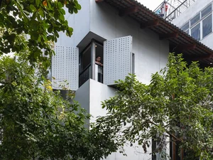 Innovative Hanoi House with Unique Tiled Roof Architecture Featured in US Media - image 3