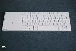 Affordable Slim Keyboard with Integrated Trackpad for Minimalist Setups - image 6