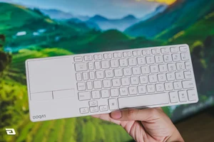 Affordable Slim Keyboard with Integrated Trackpad for Minimalist Setups - image 3