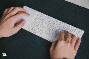 Affordable Slim Keyboard with Integrated Trackpad for Minimalist Setups - image 9