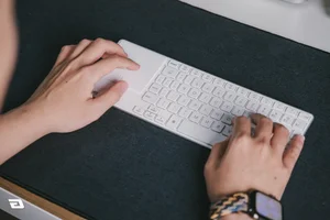 Affordable Slim Keyboard with Integrated Trackpad for Minimalist Setups - image 5