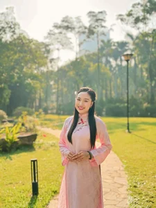 Radiant Grace: The Timeless Beauty of Pink Ao Dai - image 7