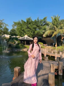 Radiant Grace: The Timeless Beauty of Pink Ao Dai - image 6
