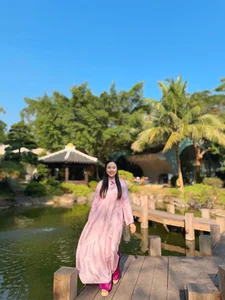 Radiant Grace: The Timeless Beauty of Pink Ao Dai - image 4