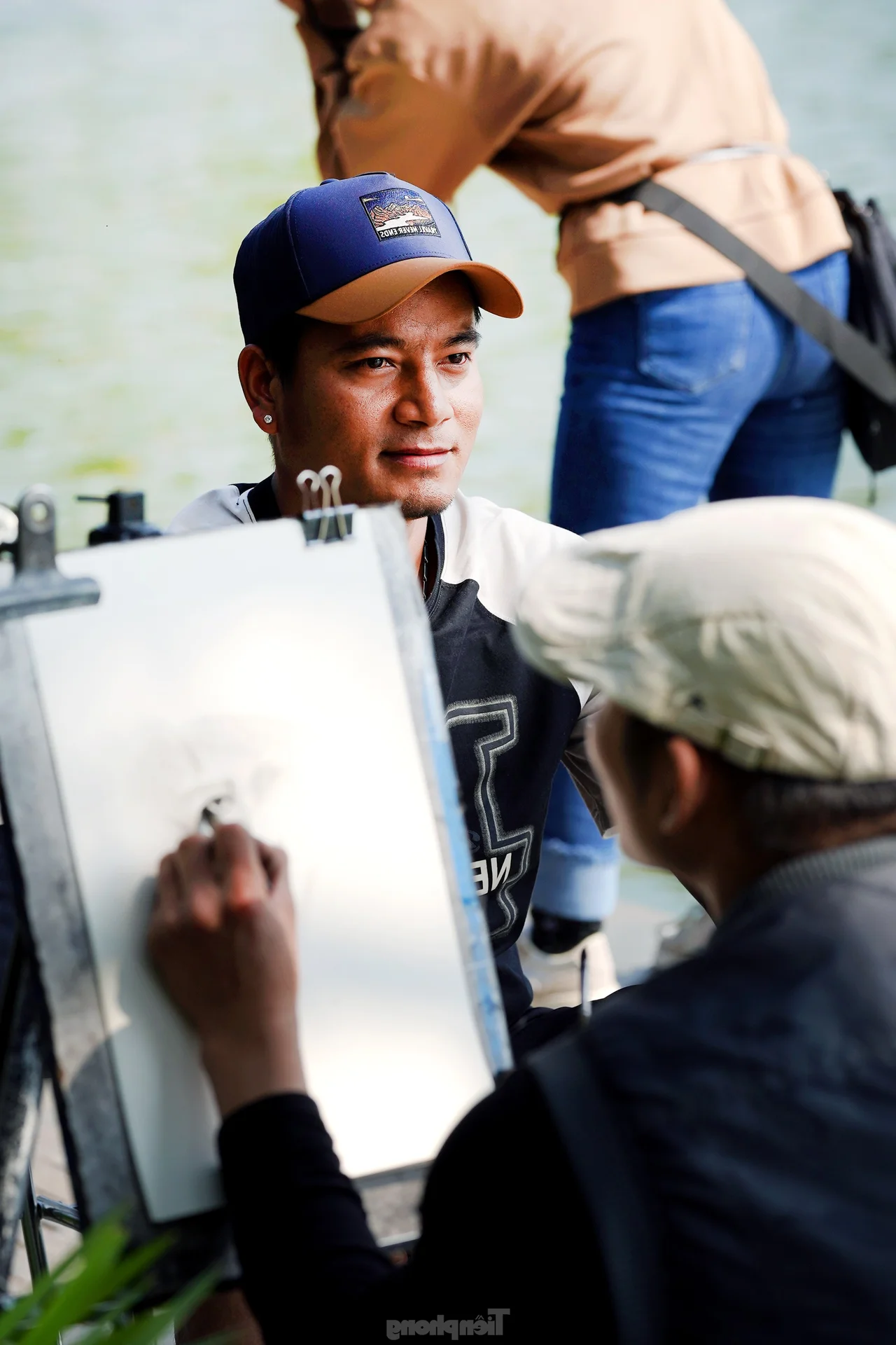 Hanoi's Hoan Kiem Lake Crowded with Tourists During Sunny Lunar New Year Celebrations