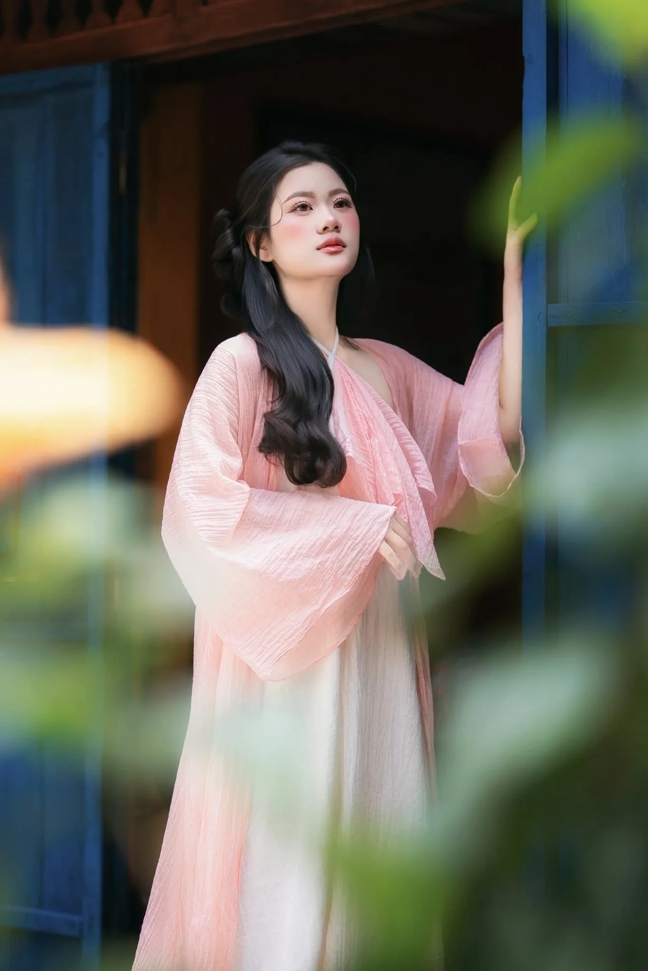 Ethereal Muse in Traditional Silk and Ancient Architecture