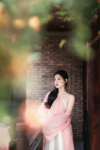 Ethereal Muse in Traditional Silk and Ancient Architecture - image 2